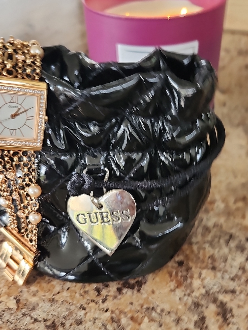 GUESS Black Quilted Patent Mini Wristlet with Silver Heart Charm